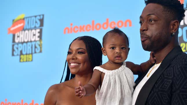 Gabrielle Union, Kaavia James Union Wade and Dwyane Wade attend Nickelodeon Kids’ Choice Sports 2019 on July 11, 2019, in Santa Monica, Calif. 