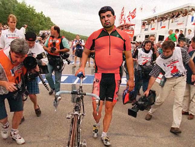 Image for article titled Overweight Cyclist Walking His Bike For Rest Of Tour De France