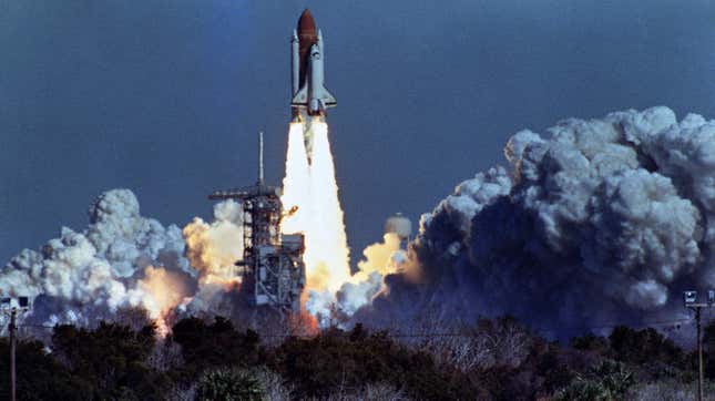 US space shuttle Challenger lifts off 28 January 1986 from a launch pad at Kennedy Space Center, 72 seconds before its explosion killing it crew of seven. Challenger was 72 seconds into its flight, traveling at nearly 2,000 mph at a height of ten miles, when it was suddenly enveloped in a red, orange and white fireball as thousands of tons of liquid hydrogen and oxygen fuel exploded.
