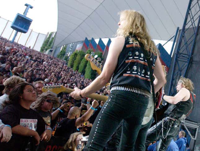Image for article titled Cheering Crowd Actually Trying To Get Attention Of Guy Behind Iron Maiden