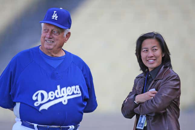 Kim Ng, with Tommy Lasorda. Ng worked for the Los Angeles Dodgers from 2002 to 2011.