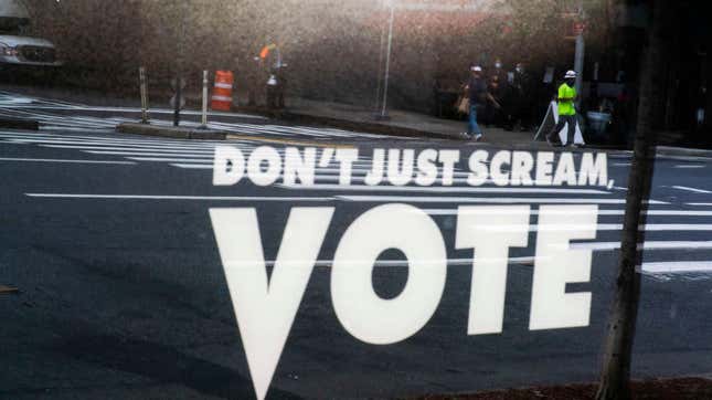 Sign reading, "Don't just scream, VOTE"