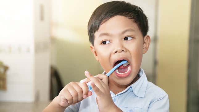 Image for article titled Your Favorite Hacks for Getting Kids to Brush Their Teeth