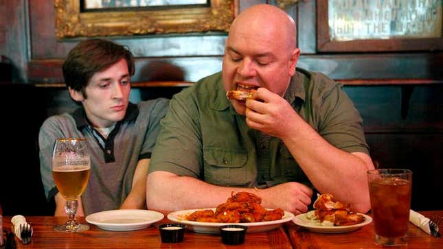Image for article titled Man Pushed Off Plate Of Chicken Wings By Larger Male