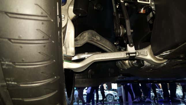 2019 BMW 3 Series double-joint spring strut front suspension as viewed from the rear