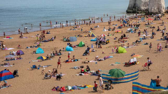Members of the public relax on the beach at Botany Bay on May 26, 2020 in Margate, England.