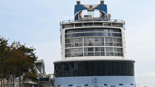 The Royal Caribbean cruise ship Quantum of the Seas is seen docked at Marina Bay Cruise Centre in Singapore on December 9, 2020, after a passenger onboard the “cruise to nowhere” tested positive for the Covid-19 coronavirus.