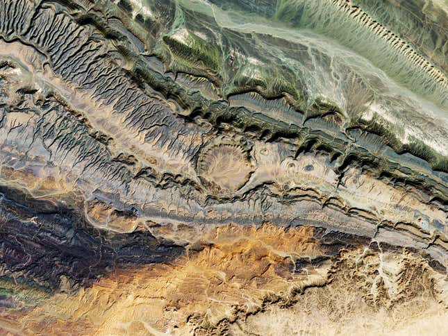 Satellite view of Ouarkziz crater, located in northwestern Algeria near the Morocco border. This image shows a closer view of the 3.5-km asteroid impact dated to be less than 70 million years old.