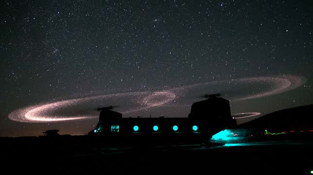 Dust lights up the rotors of a CH-47 Chinook helicopter as paratroopers with 3rd Squadron, 73rd Cavalry Regiment load for an air assault mission near Combat Outpost Ab Band May 23, 2012, Ghazni Province, Afghanistan. The unit is part of the 82nd Airborne Division’s 1st Brigade Combat Team, which deployed to the area in March to help bring security to the areas along the country’s main road between Kabul and Kandahar.