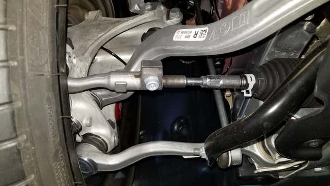 Toyota Supra double-joint spring strut front suspension as viewed from the front