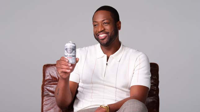 Dwyane Wade poses with a can of Budweiser Zero