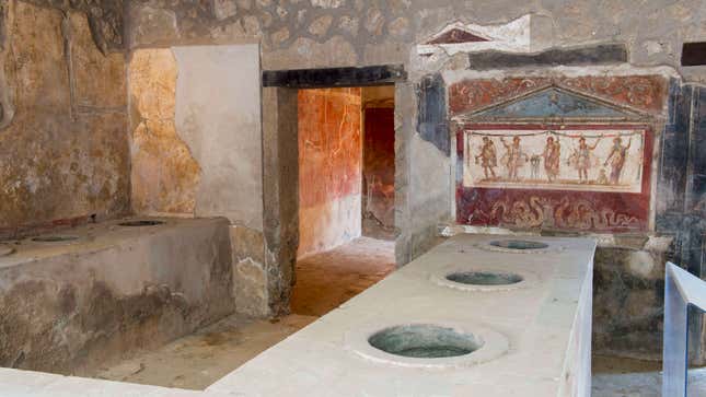 Remains of an ancient home with snack bar in Pompeii