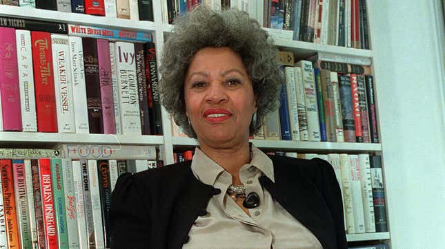 In this Sept. 1987 file photo, author Toni Morrison poses with a copy of her book “Beloved” in New York.