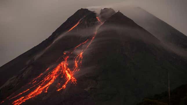 Lava flows down side of volcano