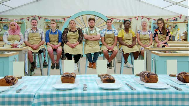 GBBO contestants seated in a row