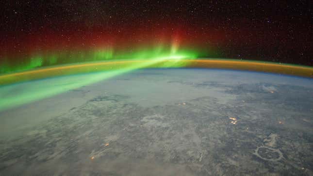 An astronaut aboard the International Space Station adjusted the camera for night imaging and captured the green veils and curtains of an aurora over Quebec, Canada.