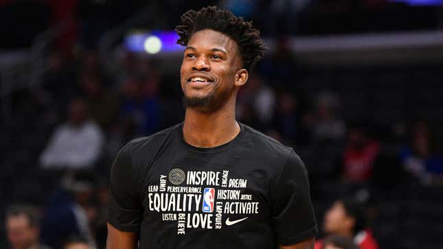 Jimmy Butler smiling on the basketball court
