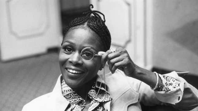 Cicely Tyson peers through a monocle at the Dorchester Hotel in London, Feb. 19, 1973.