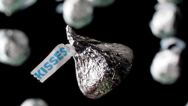 Silver Hershey Kiss on a black background