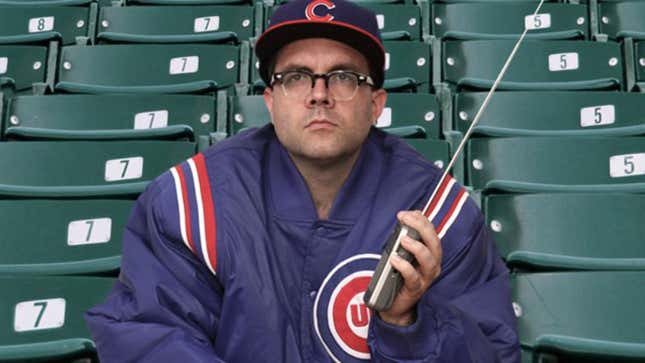 Image for article titled Team Jacket-Wearing, Transistor Radio-Listening Fan Sitting By Himself