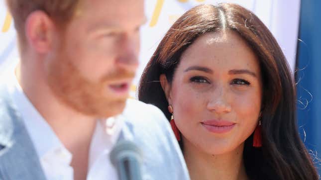 Meghan, Duchess of Sussex looks on as Prince Harry, Duke of Sussex speaks during a visit on October 02, 2019 in Johannesburg, South Africa.