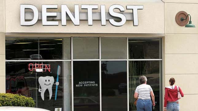 Image for article titled Logo Of Smiling Cartoon Tooth Holding Brush Inspires Nothing But Confidence In Local Oral Surgeon