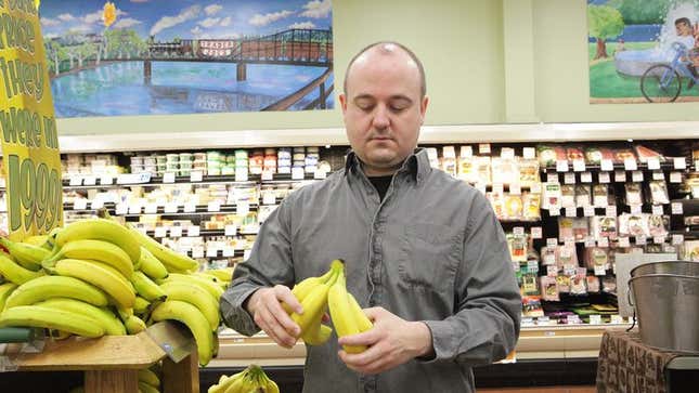 Image for article titled Sad Man Tears 2 Bananas Off Larger Bunch