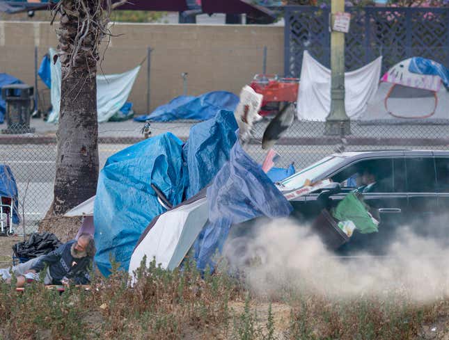 Image for article titled Trump Orders Presidential Motorcade To Take Detour Through Homeless Encampment
