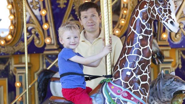 Image for article titled Pathetic 4-Year-Old Needs Father To Stand On Merry-Go-Round Platform For Entire Ride