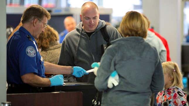 Image for article titled TSA Agent Can’t Bring Himself To Make Dad Take Off Comfy Shoes