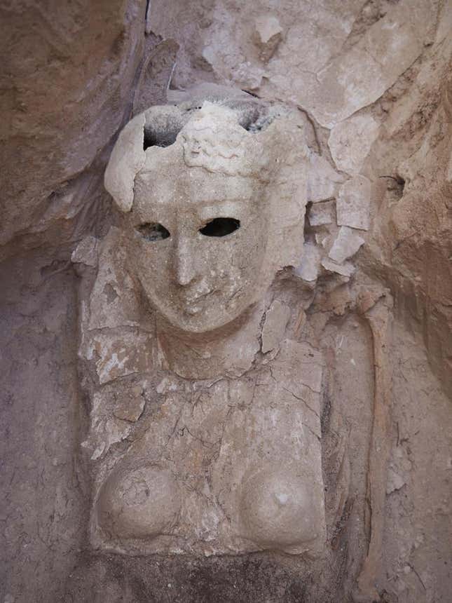 A funeral mask found in the tomb.