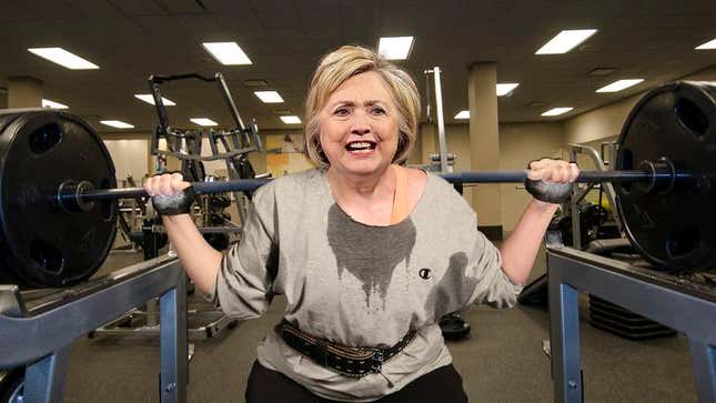 Image for article titled Hillary Clinton Sets Personal Single Rep Squat Record While Watching Bernie Sanders On Gym TV