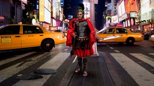 In just one of the many nutty scenarios set to befall him, the Roman centurion knelt and prayed before the large bronze Atlas statue outside Rockefeller Center.
