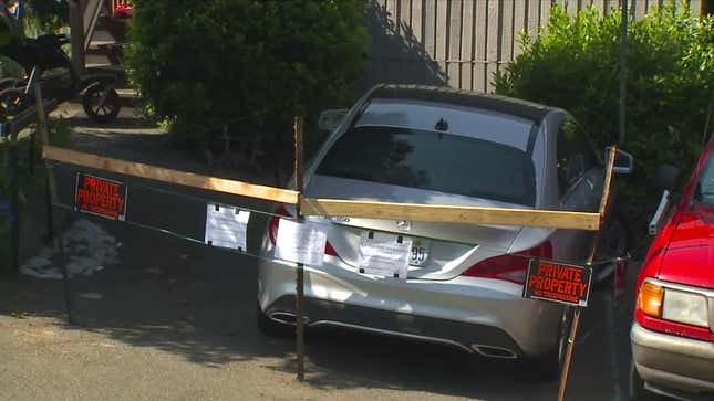 Image for article titled Car2stay: Frustrated Man Builds Fence Around Car2go Parked in His Driveway, Demands Fee