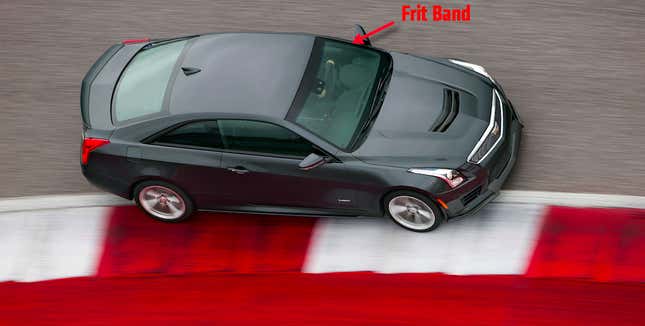Image for article titled Here's What Those Black Dots at the Edge of Your Windshield Actually Do
