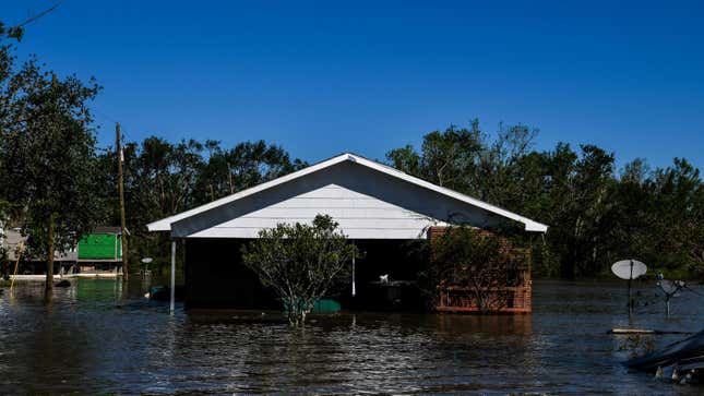 Houses are surrounded by flood waters after Hurricane Delta passed through the area on Oct. 10, 2020 near Lake Charles, Louisiana. 