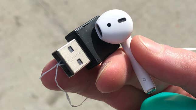 Image for article titled Rescue a Fallen AirPod With a Juul Charger and Floss