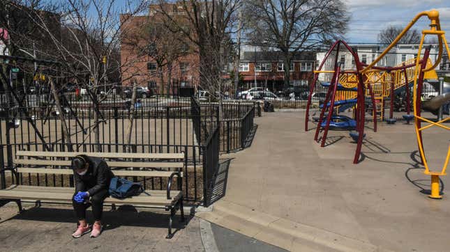A person sits in a playground in the East Elmhurst neighborhood on April 1, 2020 in New York City.
