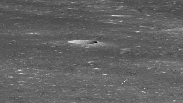 The lunar far side, with arrows pointing to the Chang’e 4 landing site.
