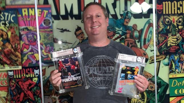 Joshua Entin holds high-grade copies of the NES games Mike Tyson’s Punch-Out and Metroid.