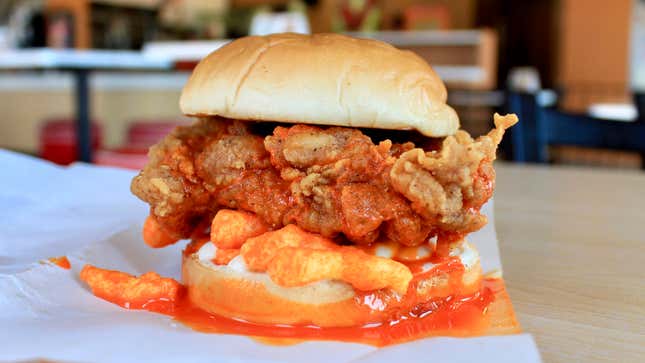 Image for article titled We tried the KFC Cheetos sandwich so now you&#39;ll have to