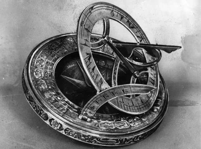 Circa 1500, An engraved bronze compass.
