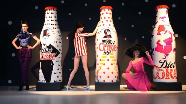Models unveil Marc Jacobs Diet Coke bottles in London
