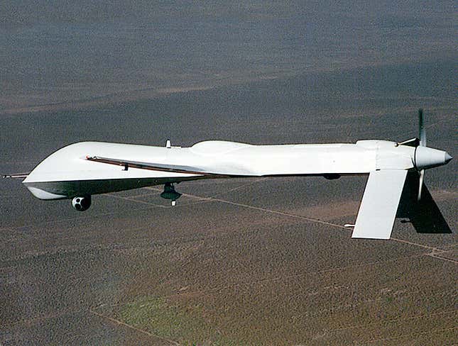 Image for article titled Spy Drone Taken Out Of Service After Returning With Creepy Photos Of Insurgents Changing