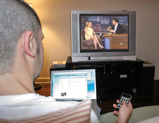 Robert Horton spends a quiet night at home with his favorite entertainment rectangles.