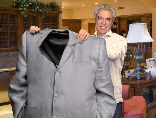 Image for article titled David Byrne Holds Up Old Suit To Show How Far He’s Come In Weight Loss Journey