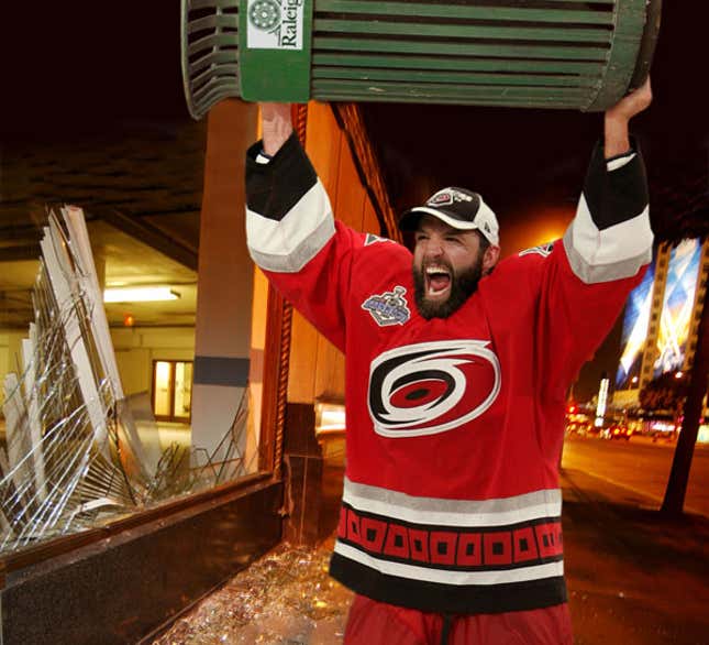 Hurricanes defenseman Bret Hedican celebrates his team's victory in the quiet, empty streets of Raleigh, causing shocked residents to wonder what is going on.