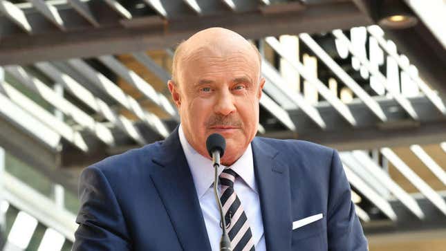 The caption on this photo on Getty refers to Dr. Phil as “Dr. him,” which rules.