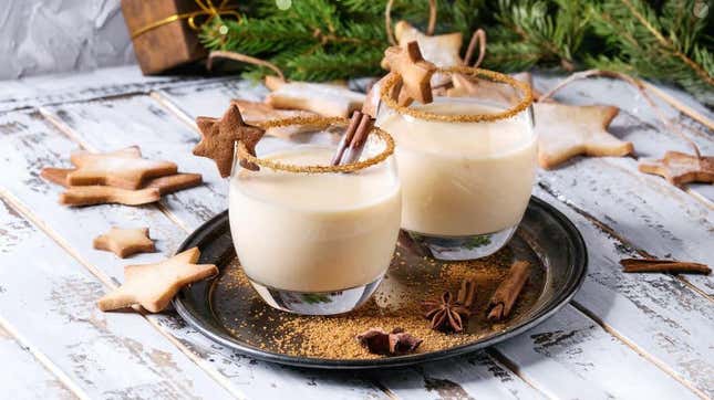 fancy eggnog surrounded by cookies