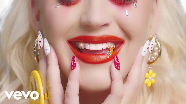 Multiple Katy Perrys turn that frown upside down in new, trippy “Smile” video